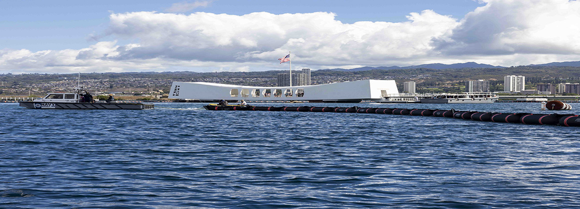 JOINT BASE PEARL HARBOR-HICKAM, Hawaii — Members of Task Force Arizona, Navy Supervisor of Salvage and Diving (SUPSALV), and local contractors deployed booms, or floating barriers, as part of preservation work at the USS Arizona Memorial, Sept. 3, 2025. In addition to continuous monitoring and protective measures, booms were placed out of an abundance of caution in the unlikely event that the preservation work causes pollutants to enter the water. Personnel from Navy Region Hawaii, SUPSALV, U.S. Navy’s Mobile Diving and Salvage Unit 1 and local contractors will work together to remove two mooring platforms from the USS Arizona in Pearl Harbor. (U.S. Navy photo by Mass Communication Specialist 2nd Class Tristan Labuguen)